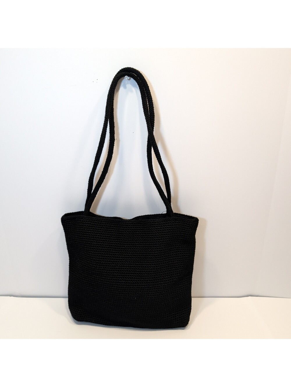 The Sak Black Crochet Shoulder Bag with Interior Zipper Pockets